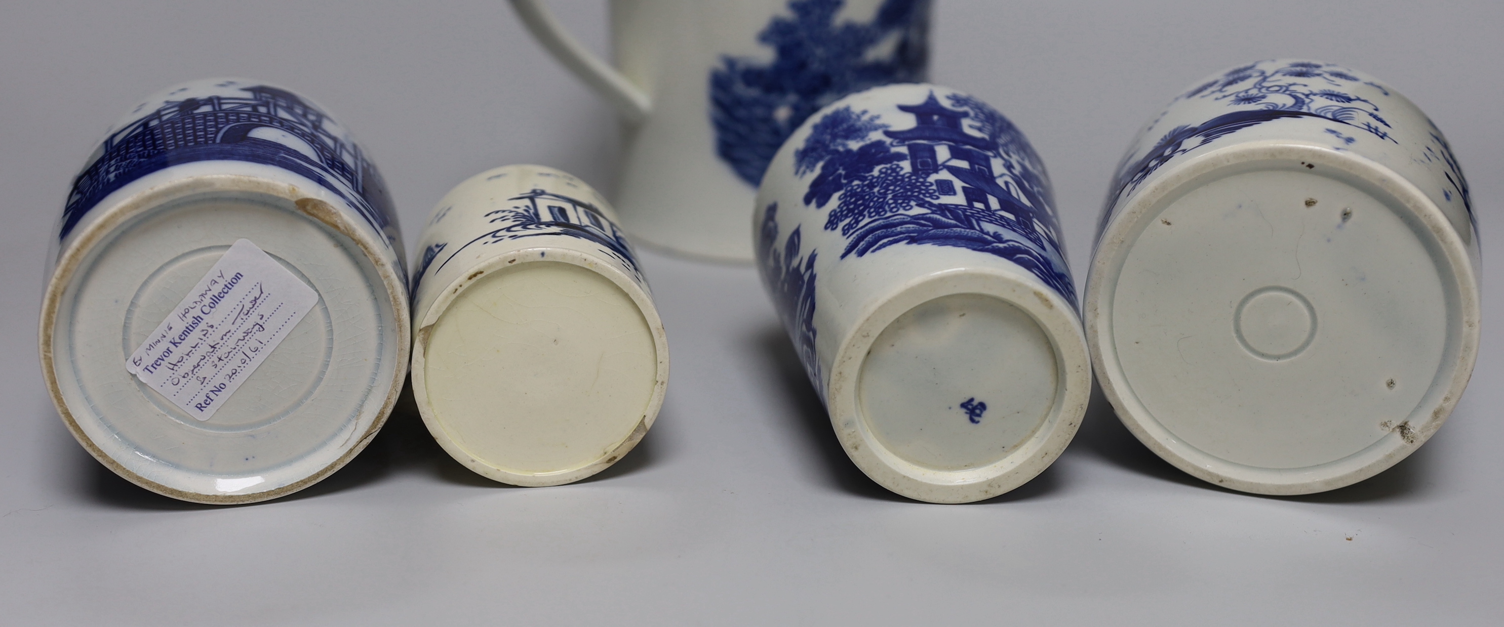 A group of mixed late 18th/early 19th century blue and white pearlware etc. tea canisters and mugs, the largest 14cm high